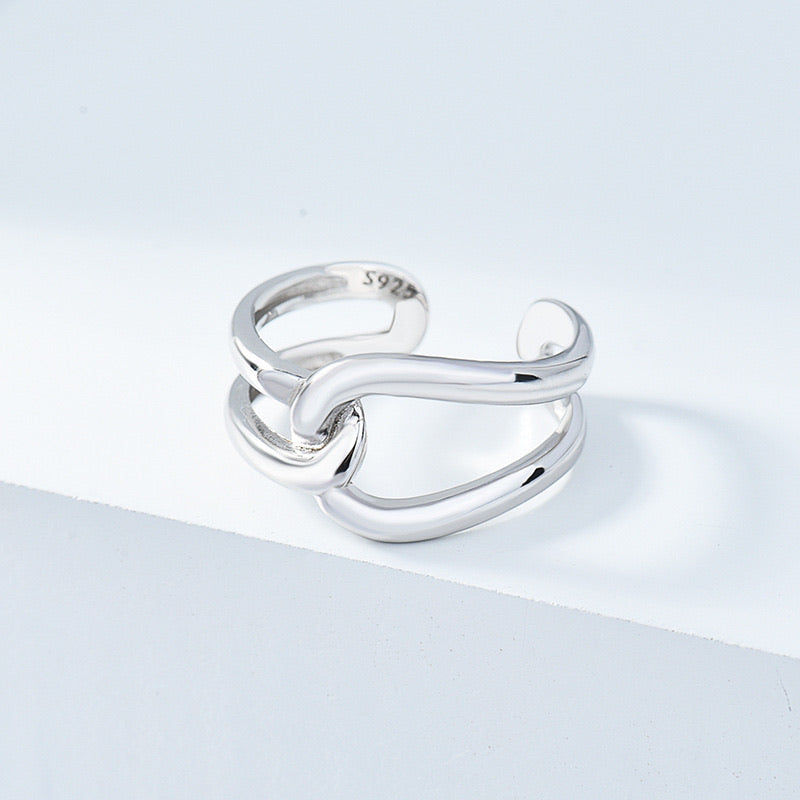 Minimalist Crossed Cercle Ring