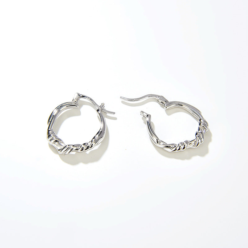 Boucles d'oreilles créoles torsadées élégantes