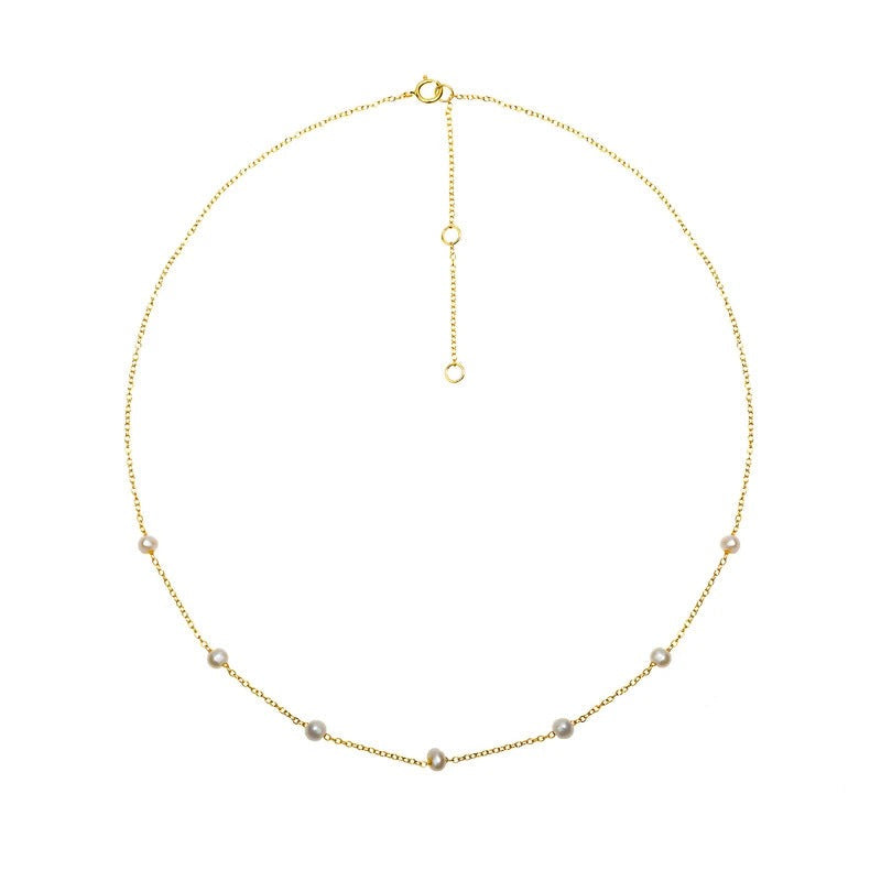 Collier ras de cou minimaliste sept perles